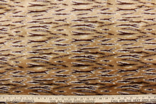 Load image into Gallery viewer, This faux fur features a  stripe design in brown, tan and hints of white . 
