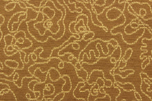 Load image into Gallery viewer,  This fabric features a floral design in gold against a golden tan.
