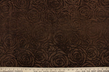 Load image into Gallery viewer,  An upholstery velvet featuring a floral design in a true brown  . 
