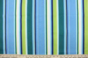  This outdoor fabric features bright stripes in blue, navy blue, lime green, dark green, turquoise, and white.