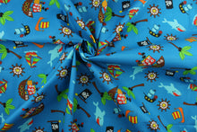 Load image into Gallery viewer, This fabric features pirate ships, sailboats, sharks, palm trees, boat wheels and flags against a blue background.  The versatile lightweight fabric is soft and easy to sew.  It would be great for quilting, crafting and sewing projects.  Colors included are brown, black, white, green, yellow, red, orange and blue.  We offer this design in other colors.
