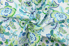 Load image into Gallery viewer,  This outdoor fabric features a floral print in varying shades of green, blue, turquoise, and pale gray against a white  background and is perfect for any project where the fabric will be exposed to the weather. 
