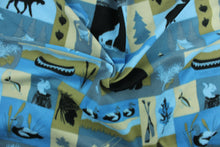 Load image into Gallery viewer, This ultra soft, medium weight printed fleece is the go to fabric for warmth.  The camping theme features tents, boats, lanterns and various animals and is perfect for creating jackets, vests, scarves, gloves, throws, bedding and more!  Colors included are blue, black, brown and beige.  We offer this design in one other color.
