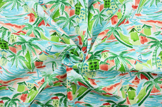 This outdoor fabric features a tropical outdoor design in peach, coral, green, blue, turquoise and white. 