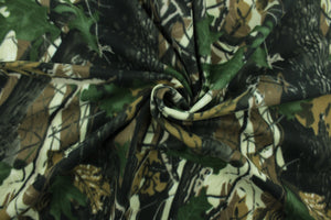 This ultra soft, medium weight printed fleece is the go to fabric for warmth.  The camouflage design in the colors of green, black, brown and off white is perfect for creating jackets, vests, scarves, gloves, throws, bedding and more! 