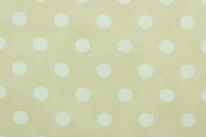 Moda features big white polka dots against a beige background.  The versatile lightweight fabric is soft and easy to sew.  It would be great for quilting, crafting and sewing projects.  