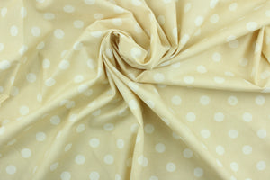 Moda features big white polka dots against a beige background.  The versatile lightweight fabric is soft and easy to sew.  It would be great for quilting, crafting and sewing projects.  