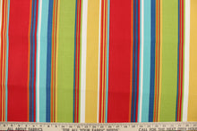 Load image into Gallery viewer, This outdoor fabric features a stripe design in  golden yellow, red, blue, white, orange, and turquoise .
