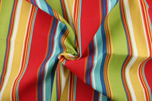 Load image into Gallery viewer, This outdoor fabric features a stripe design in  golden yellow, red, blue, white, orange, and turquoise .
