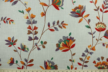Load image into Gallery viewer, Pirovette is a multi use fabric featuring a floral design in green, red, purple, brown, beige and orange against a stone gray background.  It can be used for several different statement projects including window accents (drapery, curtains and swags), decorative pillows, hand bags, bed skirts, duvet covers, upholstery and craft projects.  It has a soft workable feel yet is stable and durable.
