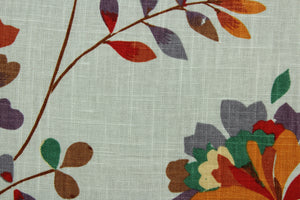 Pirovette is a multi use fabric featuring a floral design in green, red, purple, brown, beige and orange against a stone gray background.  It can be used for several different statement projects including window accents (drapery, curtains and swags), decorative pillows, hand bags, bed skirts, duvet covers, upholstery and craft projects.  It has a soft workable feel yet is stable and durable.