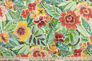 This outdoor fabric features a vibrant floral design in golden yellow, burgundy, green, dark brown, beige, dark orange, varying shades of green, dark coral and white. 