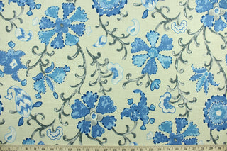This multi purpose linen/rayon blend fabric features a large floral and vine design in shades of blue, gray and white against a light beige background.  It can be used for several different statement projects including window accents (drapery, curtains and swags), decorative pillows, hand bags, bed skirts, duvet covers, upholstery and craft projects.  It has a soft workable feel yet is stable and has a durability rating that exceeds 15,000 double rubs. 
