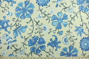 This multi purpose linen/rayon blend fabric features a large floral and vine design in shades of blue, gray and white against a light beige background.  It can be used for several different statement projects including window accents (drapery, curtains and swags), decorative pillows, hand bags, bed skirts, duvet covers, upholstery and craft projects.  It has a soft workable feel yet is stable and has a durability rating that exceeds 15,000 double rubs. 