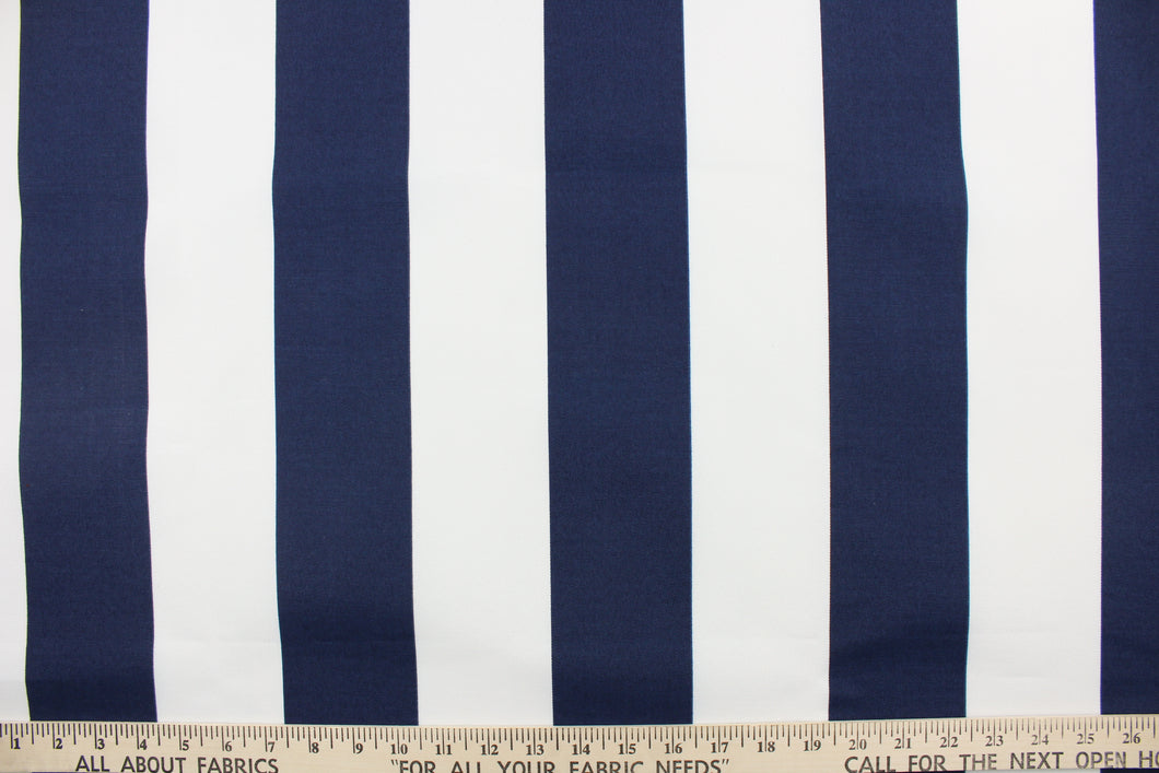  This indoor/outdoor fabric in navy blue and white stripes is perfect for any project where the fabric will be exposed to the weather. 