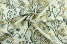 Load image into Gallery viewer, Lawrence features a large scale floral design in tan, gray, black, brown, blue gray and cream.  It can be used for several different statement projects including window accents (drapery, curtains and swags), decorative pillows, hand bags, bed skirts, duvet covers, light duty upholstery and craft projects.  It has a soft workable feel yet is stable and durable.  

