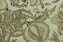 Load image into Gallery viewer, This multi purpose linen/cotton blend fabric features a large scale floral  and fruit vine in various shades of brown.  It can be used for several different statement projects including window accents (drapery, curtains and swags), decorative pillows, hand bags, bed skirts, duvet covers, upholstery and craft projects.  

