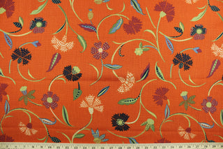  Jacobean features a floral vine design in navy blue, powder blue, green, gold and magenta against a cinnamon background.  It can be used for several different statement projects including window accents (drapery, curtains and swags), decorative pillows, hand bags, bed skirts, duvet covers, upholstery and craft projects.  It has a soft workable feel yet is stable and durable with 30,000 double rubs. 