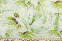 Load image into Gallery viewer,  This fabric features a leaf design in green, brown, and pale blue against a natural white background.
