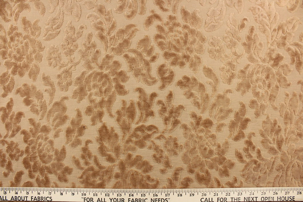  An upholstery velvet featuring a floral design in a rich beige.