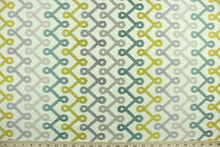 Load image into Gallery viewer, Medicago is a contemporary geometric design embroidered in citrus yellow, teal, champagne and light purple on an off white background.  Use this for light upholstery, pillows, bedding and window treatments.  
