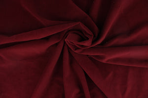  This velvet features a beautiful solid deep burgundy .