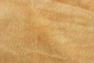 A faux fur in beige with hints of pink and green. 
