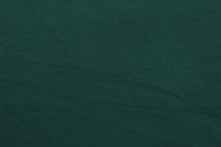 Hunter is a solid, dark green, cotton jersey fabric, has a 4-way stretch that is soft, durable, breathable and will allow movements of the body.  Uses include t-shirts, sportswear, loungewear, leggings, children's apparel, bedding and sheets.  We offer a variety of jersey fabrics.