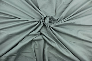 This silver cotton jersey fabric, has a 4-way stretch that is soft, durable, breathable and will allow movements of the body.  Uses include t-shirts, sportswear, loungewear, leggings, children's apparel, bedding and sheets.  We offer a variety of jersey fabrics.