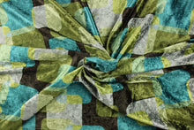 Load image into Gallery viewer, This velvet features a geometric design in green, brown, teal, gray, and moss green .
