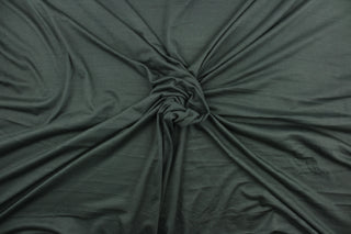 This gray cotton jersey fabric, has a 4-way stretch that is soft, durable, breathable and will allow movements of the body.  Uses include t-shirts, sportswear, loungewear, leggings, children's apparel, bedding and sheets.  We offer a variety of jersey fabrics.