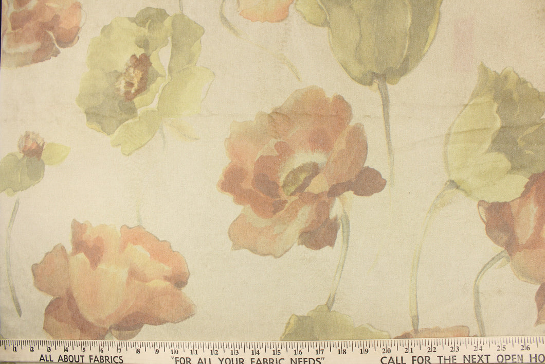  This velvet features a floral design in brown, green, peachy pink, and tan against a pale taupe .