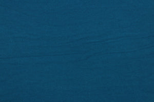 This turquoise cotton jersey fabric, has a 4-way stretch that is soft, durable, breathable and will allow movements of the body.  Uses include t-shirts, sportswear, loungewear, leggings, children's apparel, bedding and sheets.  We offer a variety of jersey fabrics.