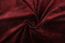 Load image into Gallery viewer, This velvet features a demask design in a tone on tone deep red  with a latex backing.
