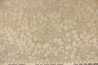 An upholstery velvet featuring a floral design in a tone on tone khaki.