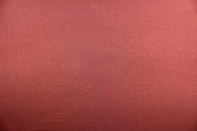 This rose cotton jersey fabric, has a 4-way stretch that is soft, durable, breathable and will allow movements of the body.  Uses include t-shirts, sportswear, loungewear, leggings, children's apparel, bedding and sheets.  We offer a variety of jersey fabrics.