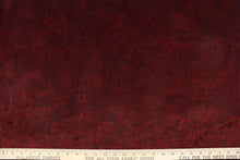 Load image into Gallery viewer,  This velvet features a muted paisley design in a tone on tone burgundy .
