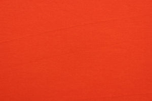 This orange cotton jersey fabric, has a 4-way stretch that is soft, durable, breathable and will allow movements of the body.  Uses include t-shirts, sportswear, loungewear, leggings, children's apparel, bedding and sheets.  We offer a variety of jersey fabrics.