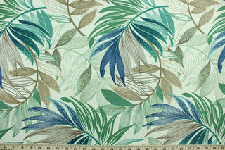 This Solarium outdoor decorative print features a large tropical leaf design in teal, sage, taupe and brown on an ivory background.  This versatile, long-lasting fabric can withstand up to 500 hours of sunlight, water and stain resistant and has 10,000 double rubs. 