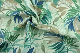 This Solarium outdoor decorative print features a large tropical leaf design in teal, sage, taupe and brown on an ivory background.  This versatile, long-lasting fabric can withstand up to 500 hours of sunlight, water and stain resistant and has 10,000 double rubs. 