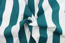 Load image into Gallery viewer, This indoor/outdoor fabric in teal and white stripes is perfect for any project where the fabric will be exposed to the weather.  
