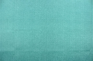  An outdoor fabric in a beautiful solid turquoise . 