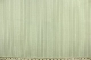 This Solarium outdoor fabric features a duotone stripe design in sand.  This versatile, long-lasting fabric can withstand up to 500 hours of sunlight, water and stain resistant and has 10,000 double rubs.  It is perfect for lounge cushions, pool furniture, tablecloths, decorative pillows and upholstery projects.  This fabric has a slightly stiff feel but is easy to work with.  