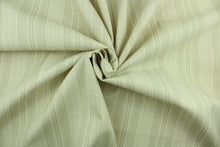 Load image into Gallery viewer, This Solarium outdoor fabric features a duotone stripe design in sand.  This versatile, long-lasting fabric can withstand up to 500 hours of sunlight, water and stain resistant and has 10,000 double rubs.  It is perfect for lounge cushions, pool furniture, tablecloths, decorative pillows and upholstery projects.  This fabric has a slightly stiff feel but is easy to work with.  
