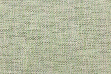 Load image into Gallery viewer, A mock linen with a weave design in brown, khaki, green, mint green and a dull white  with a light backing . 
