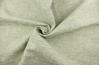 A mock linen with a weave design in brown, khaki, green, mint green and a dull white  with a light backing . 