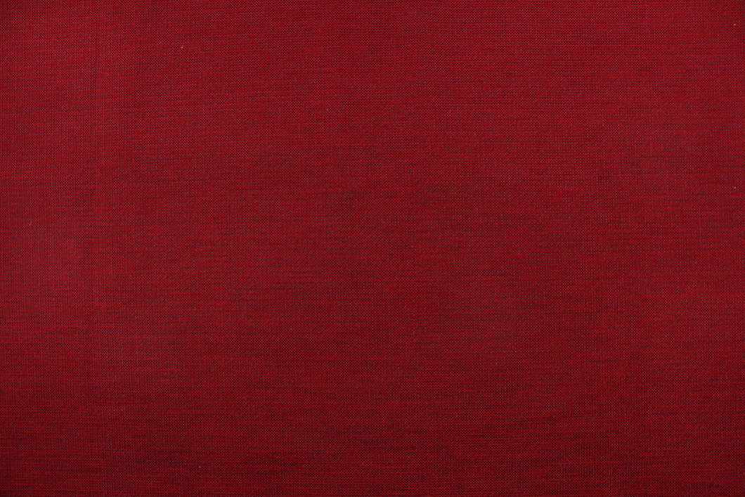  A mock linen in a weave design in a rich red and black with a light backing.