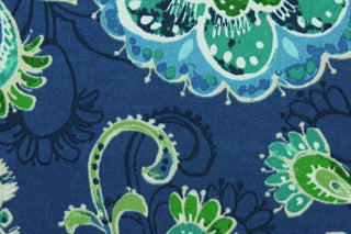 This Solarium© outdoor decorative print features abstract flowers and leaves in aqua, beige, blue, green, navy and white. This versatile, long-lasting fabric can withstand up to 500 hours of sunlight, water and stain resistant and has 15,000 double rubs.  It is perfect for lounge cushions, pool furniture, tablecloths, decorative pillows and upholstery projects.  This fabric has a slightly stiff feel but is easy to work with.  