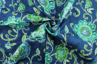 This Solarium© outdoor decorative print features abstract flowers and leaves in aqua, beige, blue, green, navy and white. This versatile, long-lasting fabric can withstand up to 500 hours of sunlight, water and stain resistant and has 15,000 double rubs.  It is perfect for lounge cushions, pool furniture, tablecloths, decorative pillows and upholstery projects.  This fabric has a slightly stiff feel but is easy to work with.  