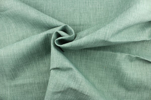  A mock linen in a solid light green with a cotton backing. 